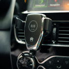 Soporte universal móvil KSIX para coche con rejilla, carga inalámbrica 15W, Carga rápida, Cierre por gravedad, Fijación Pinza